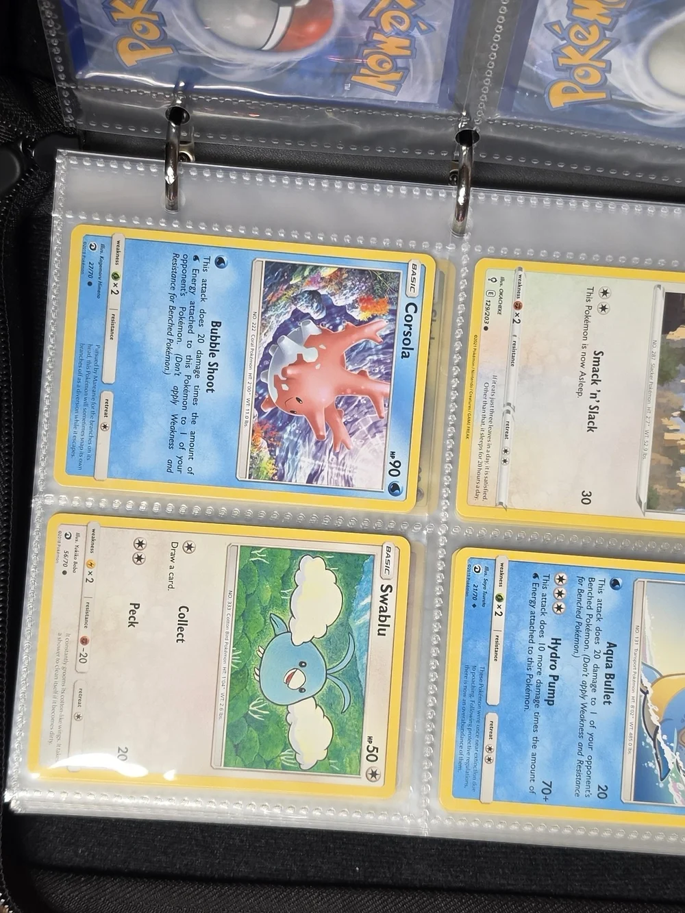 Pokemon Red and Blue Pokemon Card Binder And 53 Pokemon Cards.